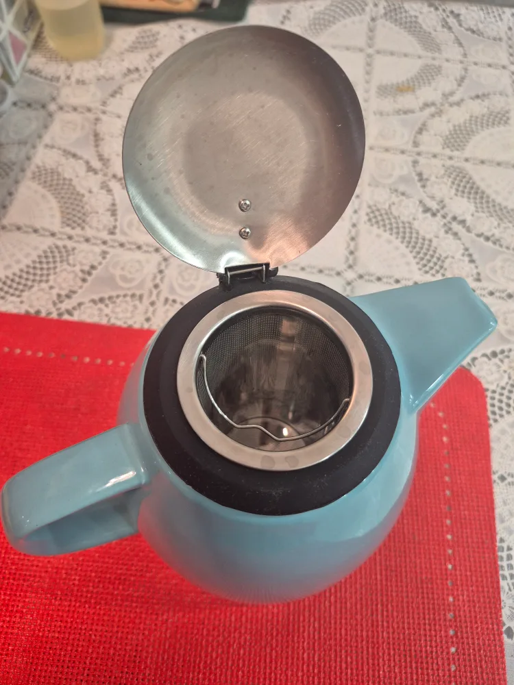 Teapot with stainless steel lid and infuser image indicator(4)