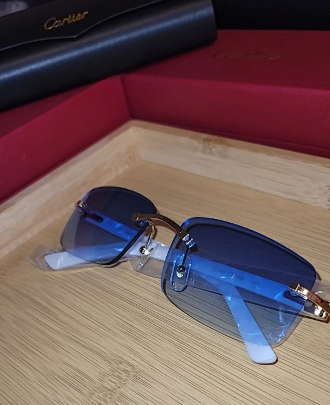 Cartier Glasses - White marble/Blue Tint image indicator(2)