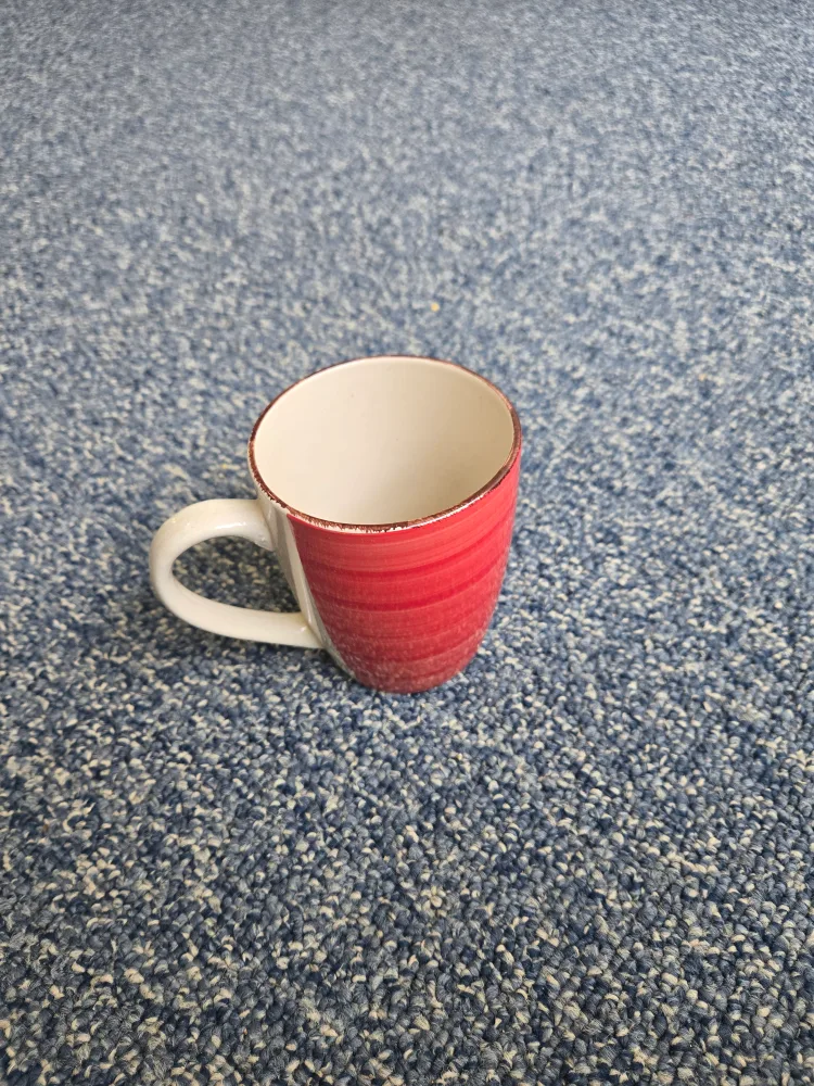 Red and white ceramic mug thumbnail