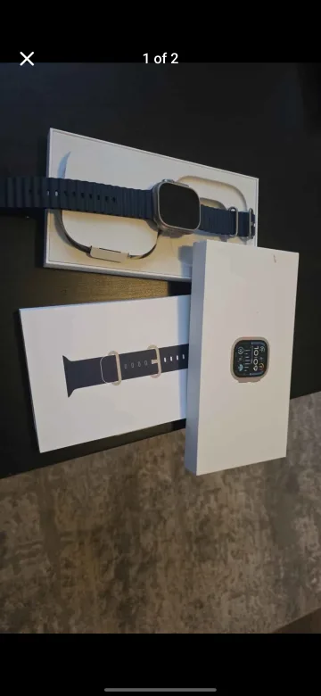 Apple Watch Ultra 2 with Box and 1 extra band image indicator(2)