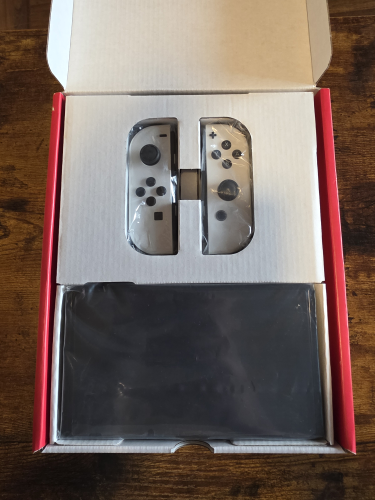 Nintendo Switch OLED in the Box Bundle - photo 2
