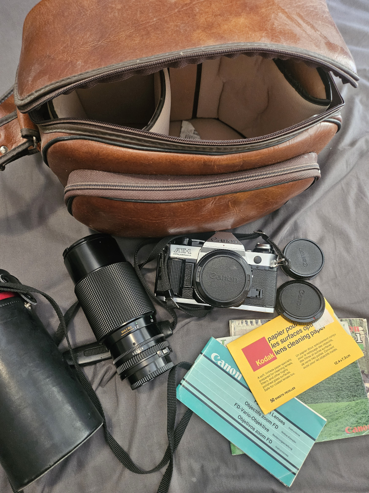 Canon AE-1 Film Camera Kit (lens, bag, guide included)