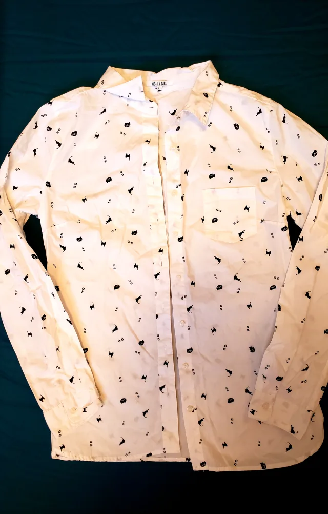 White patterned button-up shirt image indicator(2)