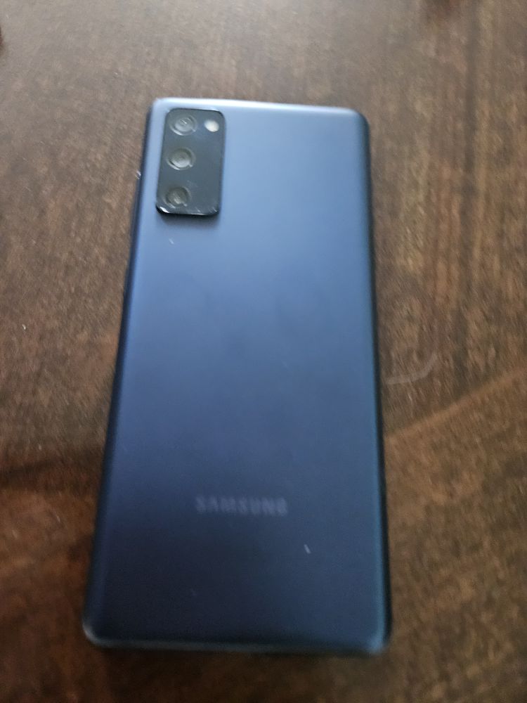 Samsung S20 FE with teal phone case/wallet - photo 4