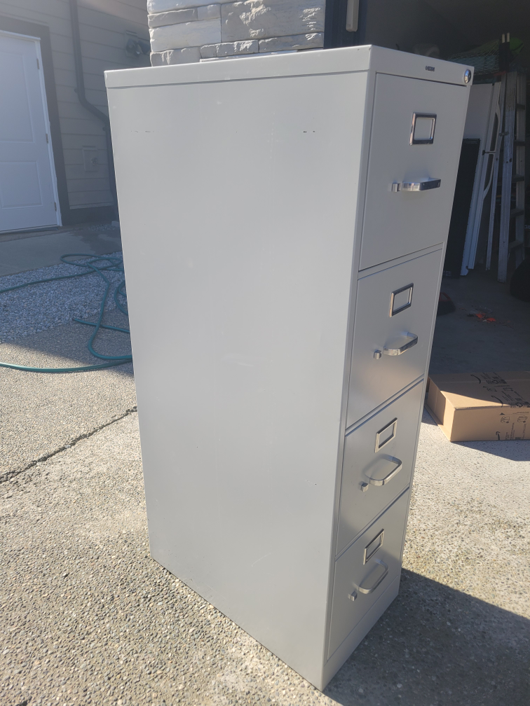 Used Grey 4-Drawer Filing Cabinet - photo 2