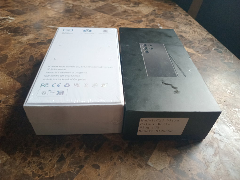 Two brand new C24 Ultra White Phone