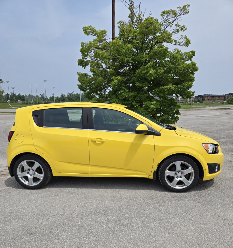 Bright Yellow 2015 Chevrolet Sonic LT - photo 3