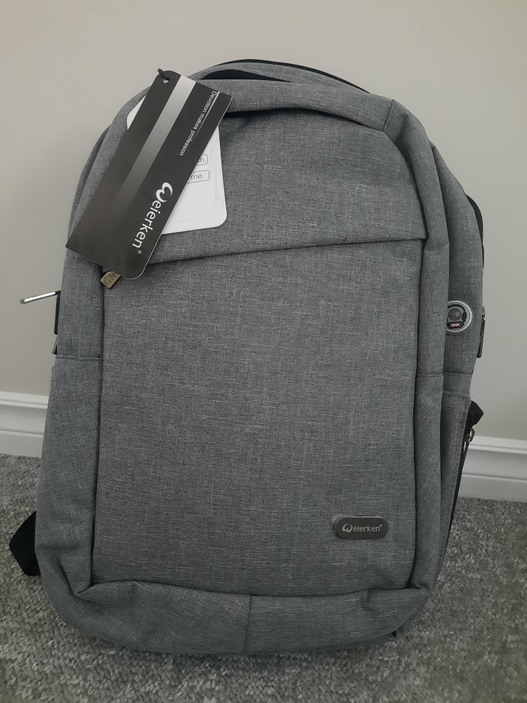 Grey Backpack with lots of space and pocket