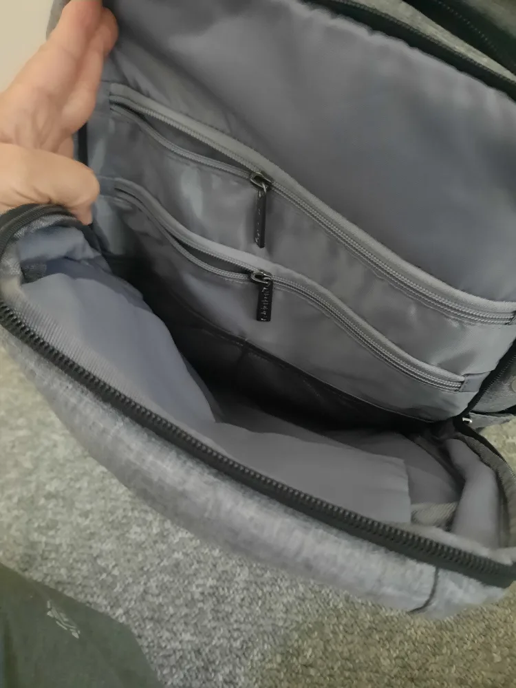 Grey Backpack with lots of space and pocket image indicator(2)