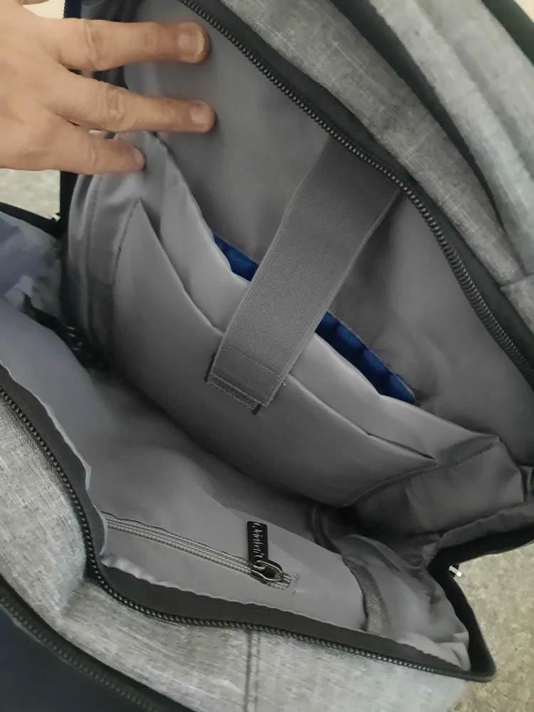 Grey Backpack with lots of space and pocket image indicator(8)