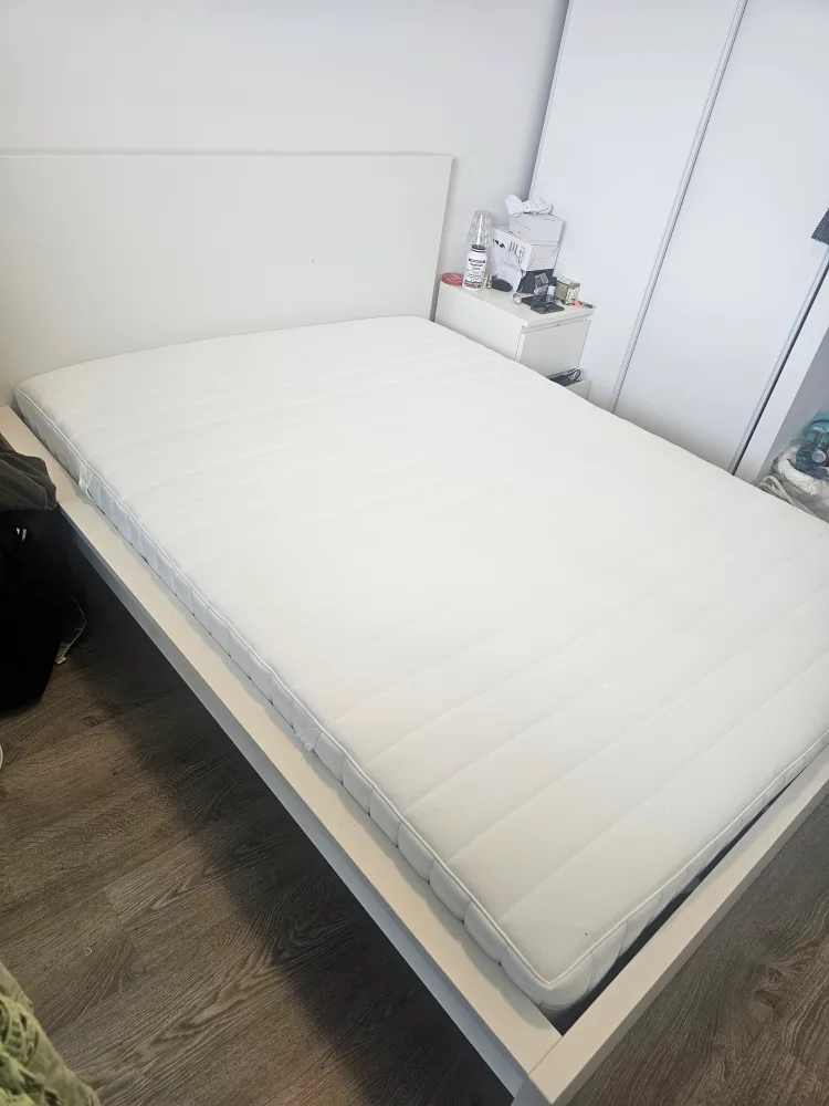 White bed frame and mattress thumbnail