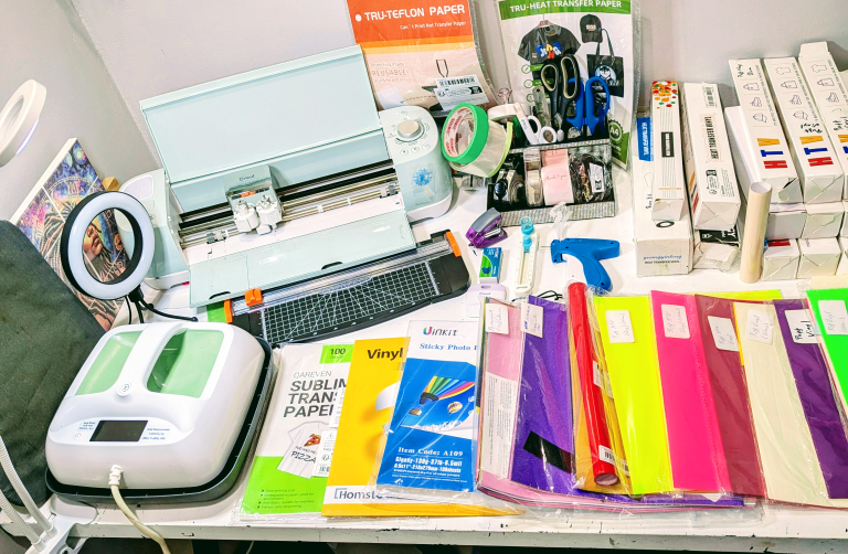 Cricut Cutting Machine, Heat press & Vinyls *Desk included*
