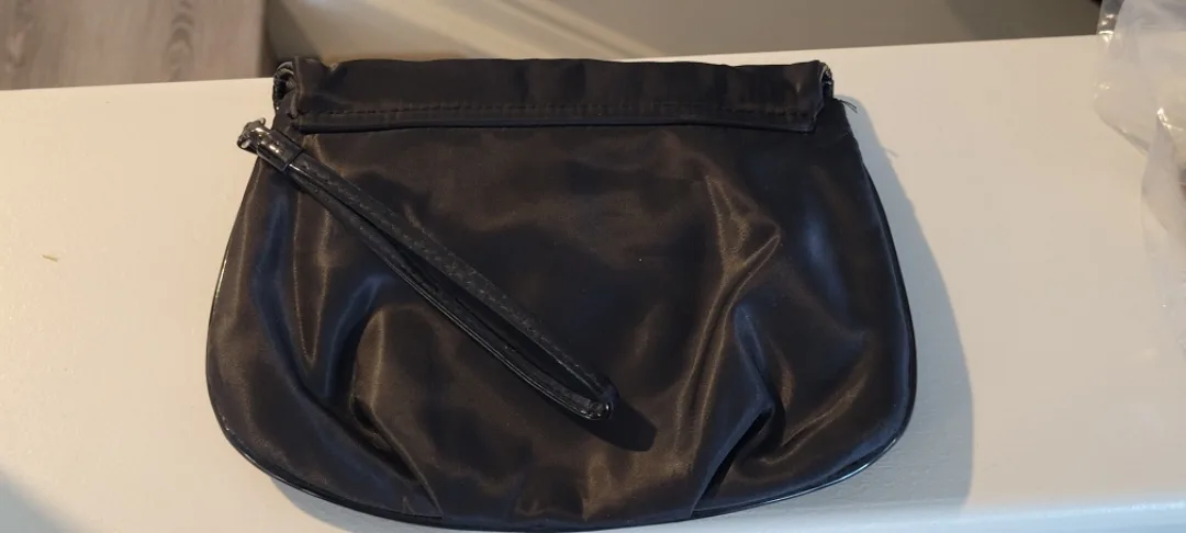 Black Clutch Purse with Floral Detail image indicator(2)