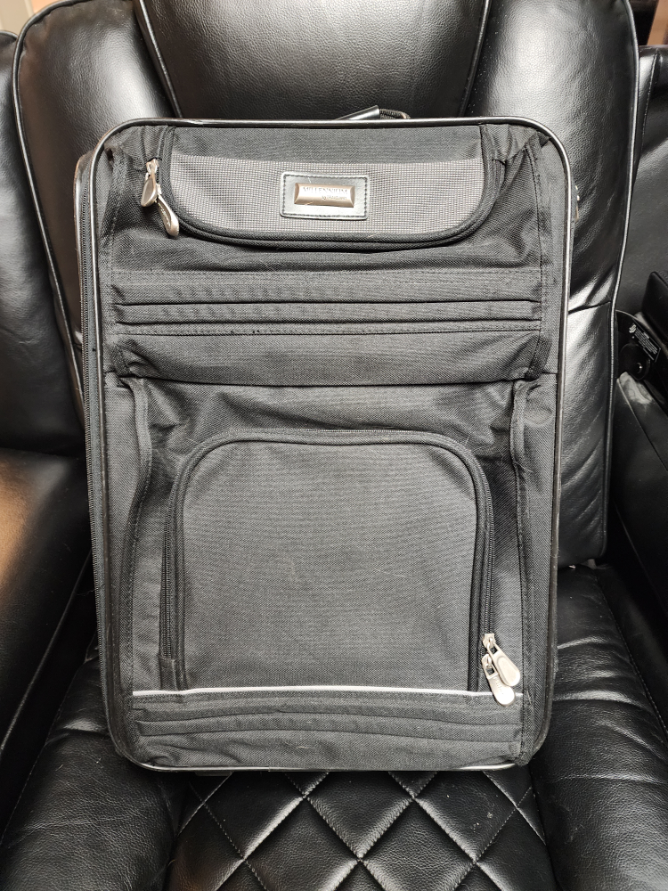 Millennium by Travelway Rolling Carry-On Luggage