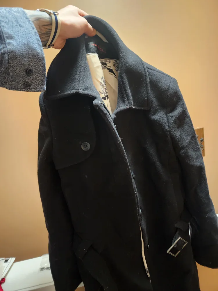 Black coat with a unique lining image indicator(2)
