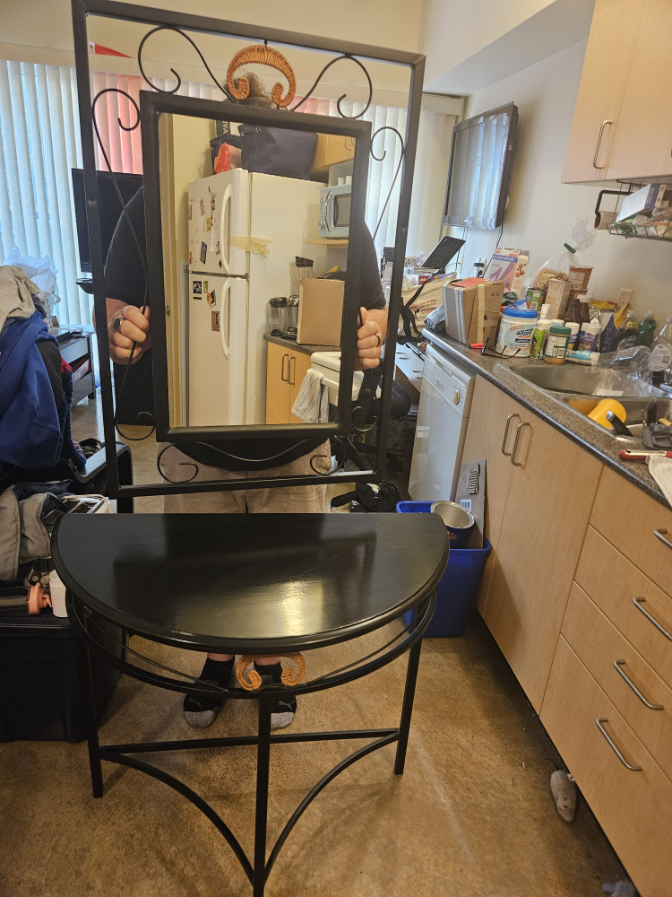 Black Metal Wall Mirror and Table