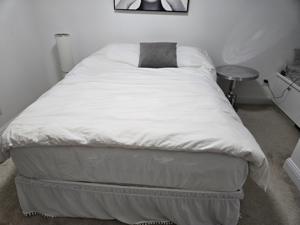 queen bed with mattress and duvet