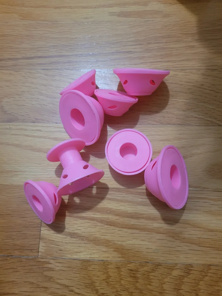 Vase, Non heating curlers and green pouch thumbnail