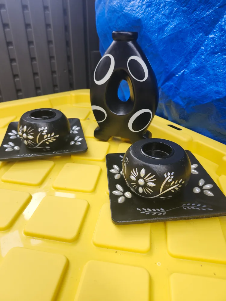 Decorative black vase and candle holders image indicator(3)