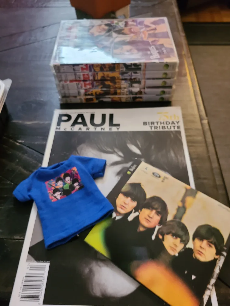 The Beatles items: DVDs, magazine, and t-shirt thumbnail