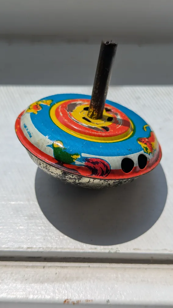 Vintage Tin Spinning Top Toy - Made in Japan 2" image indicator(2)