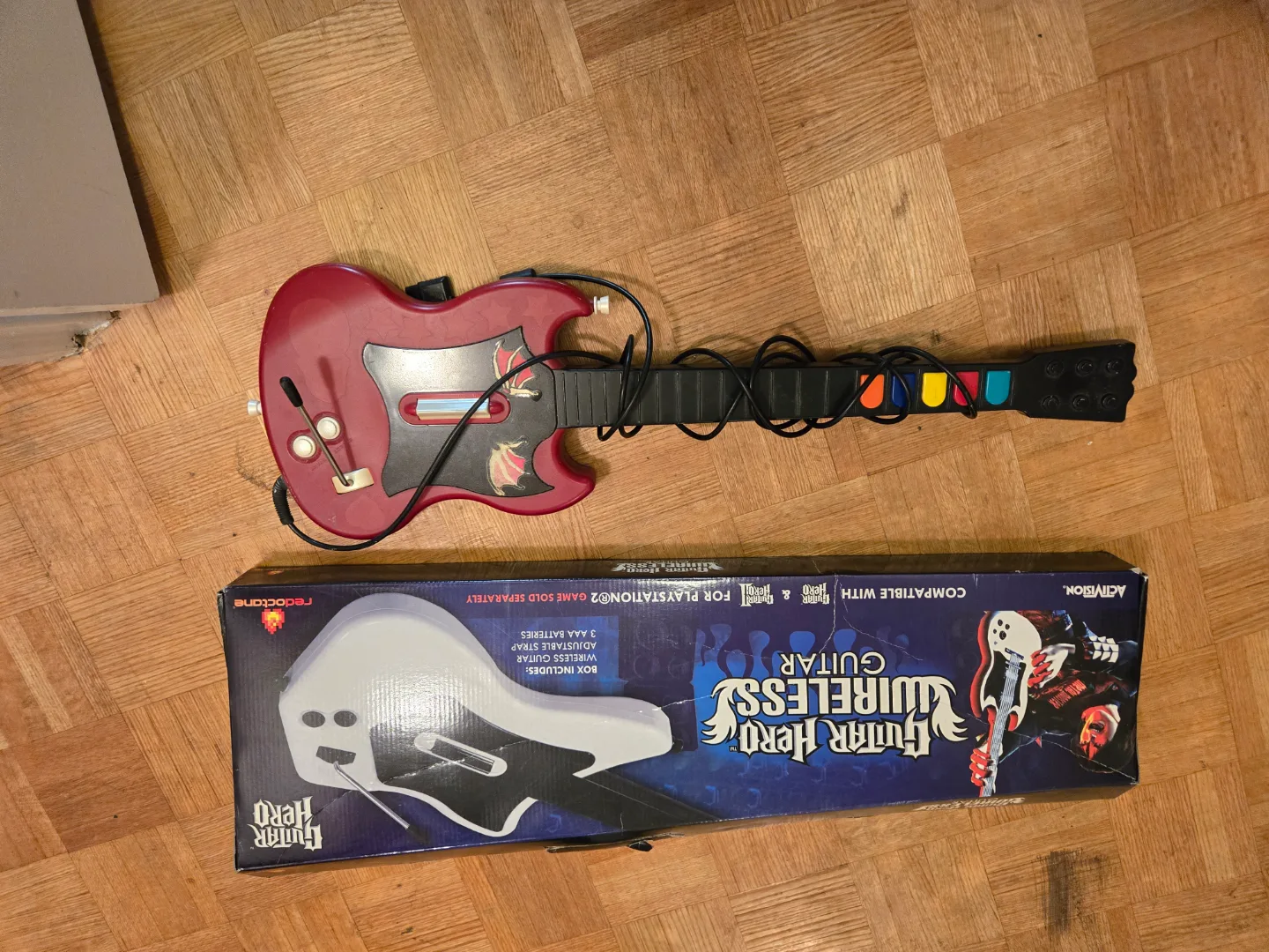 two Guitar Hero guitars for Playstation 2 thumbnail