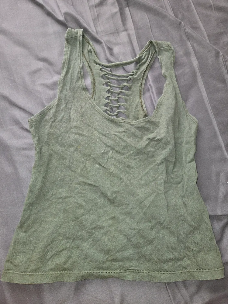 Flattering green braided top image indicator(2)