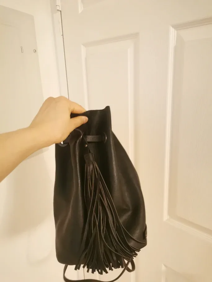 Black Leather Tassel Drawstring Backpack image indicator(6)