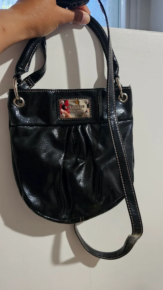 Nine small West Black Purse thumbnail