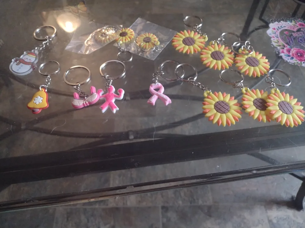 Assorted Keychains: Sunflower, Ribbon, Snowman, Bell thumbnail
