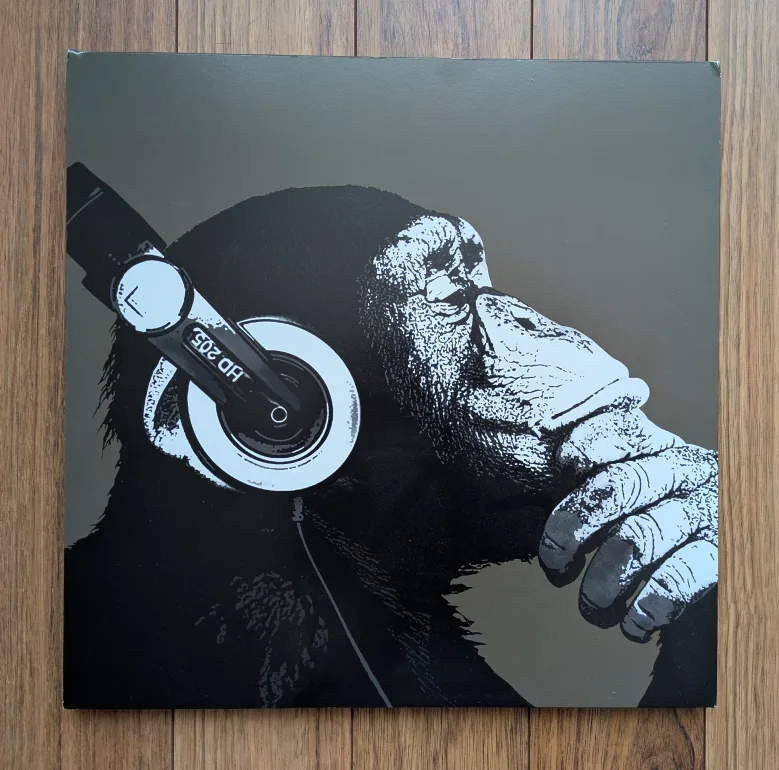 Picture of a chimp wearing headphones thumbnail