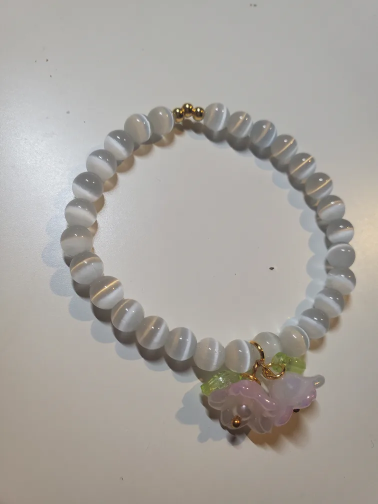 Beaded Bracelet with Bell flower Charms image indicator(2)