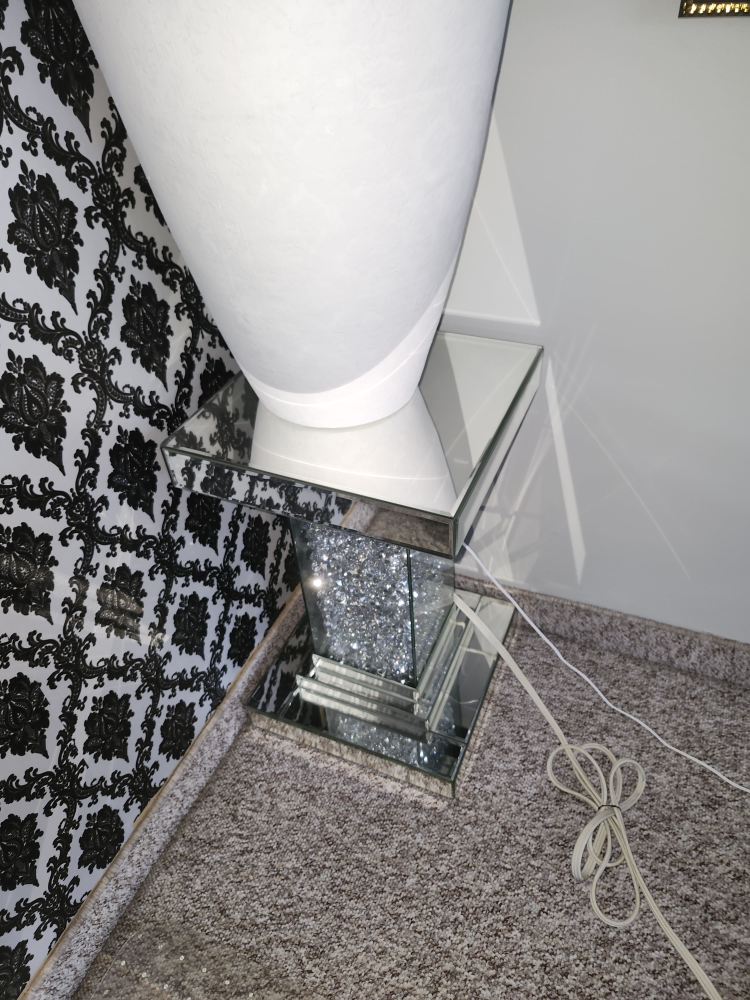mirror table with vase
