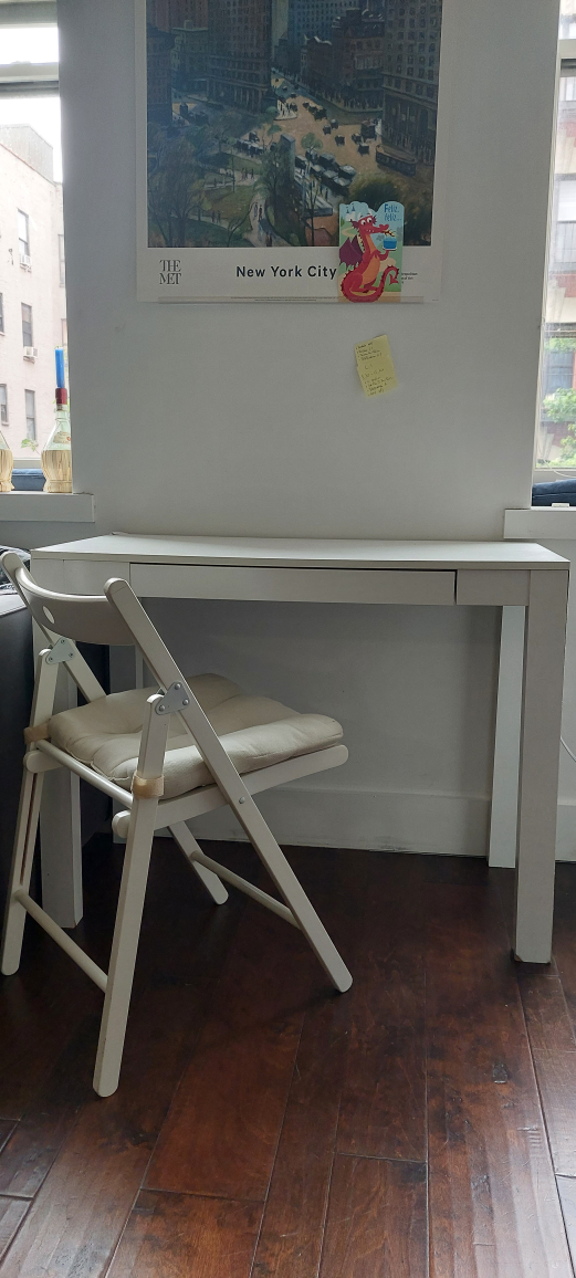 White Desk and Folding Chair