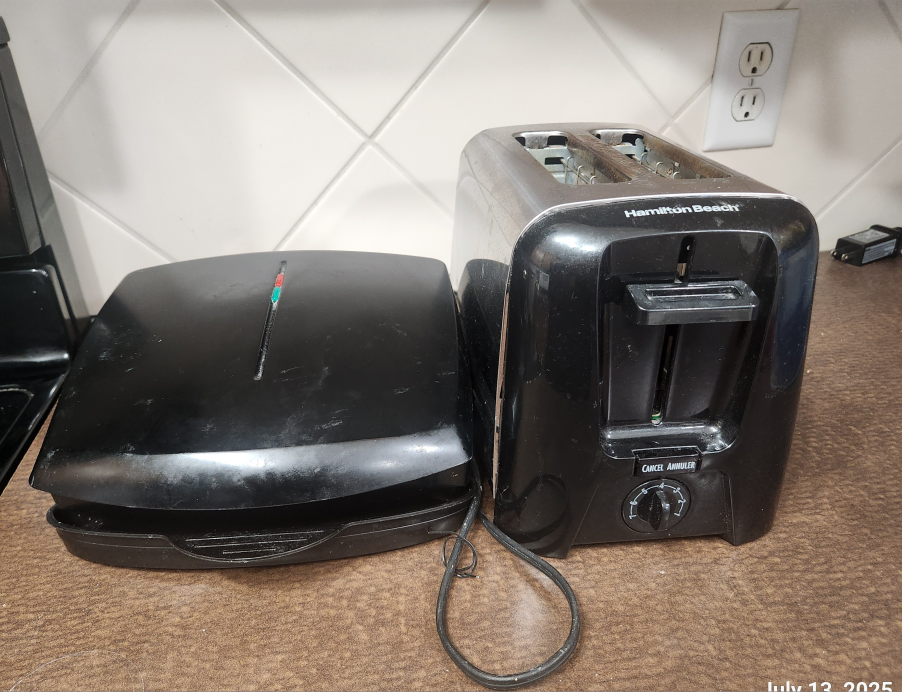 Hamilton Beach Toaster & GE Microwave Oven and sandwich toaster.