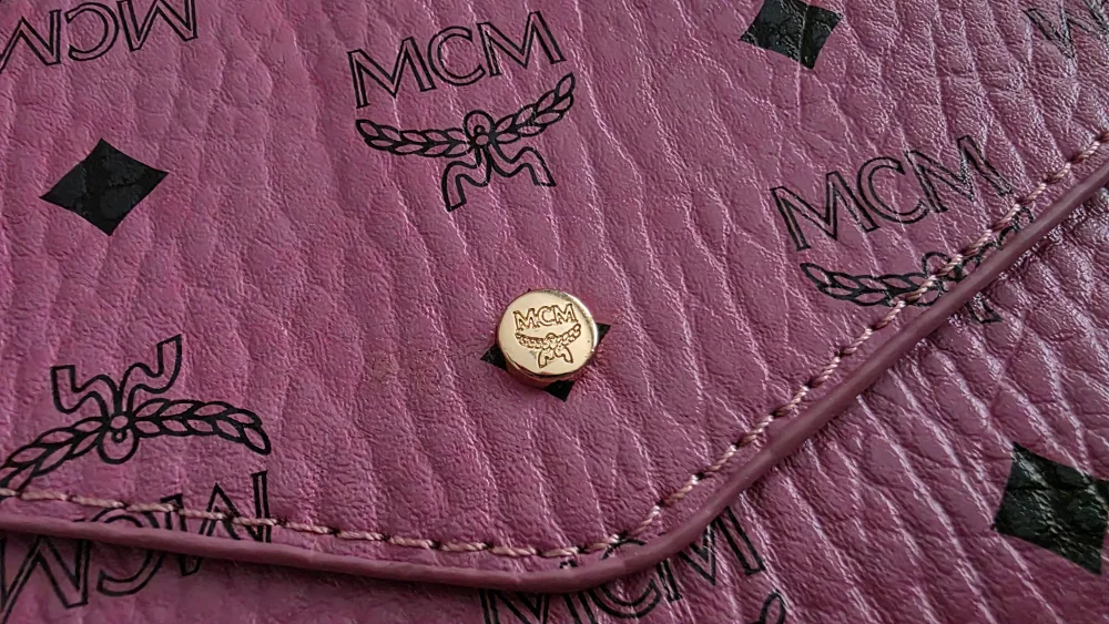 MCM Pink Leather Clutch with Box image indicator(3)