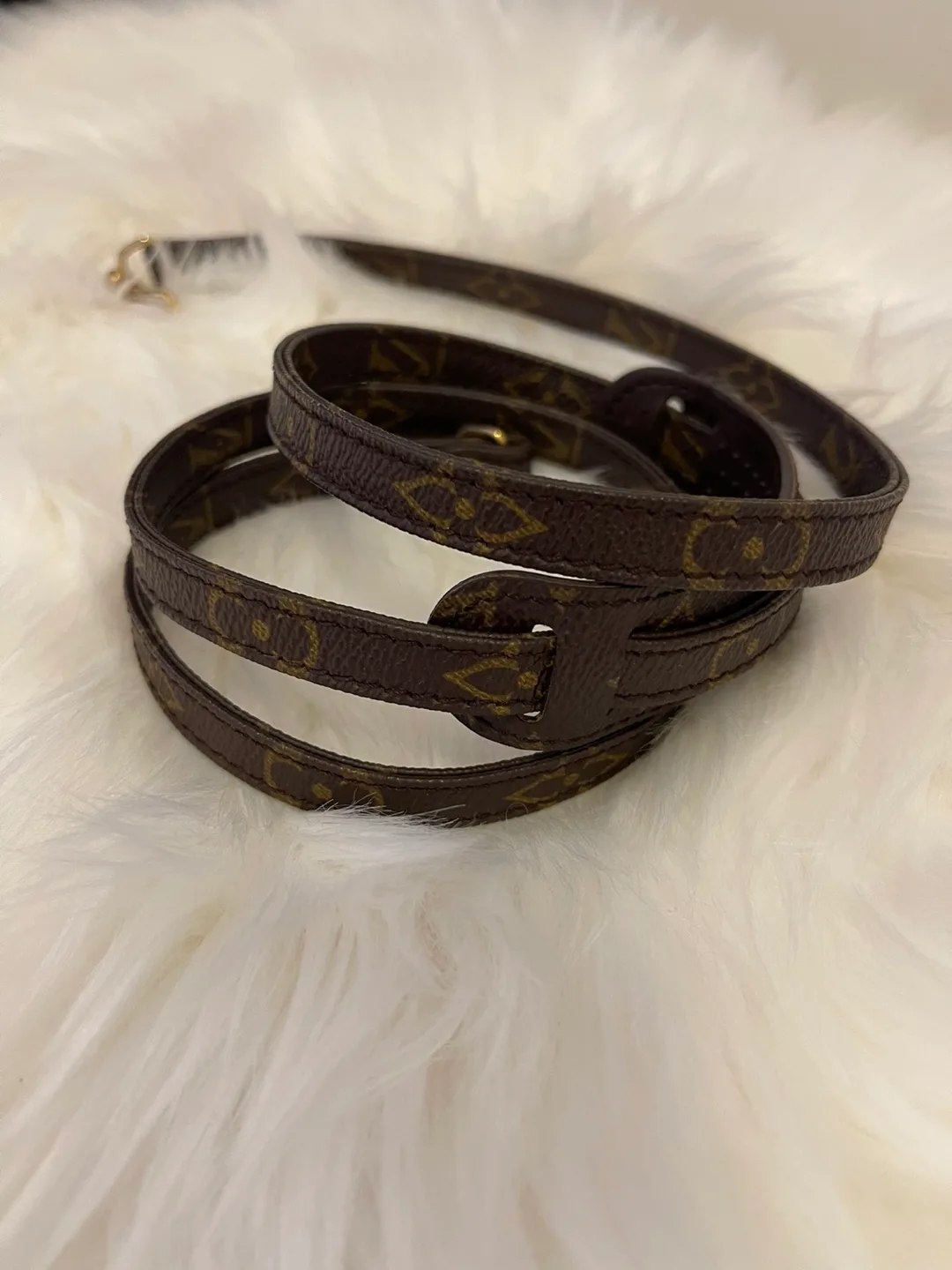 VINTAGE- Louis Vuitton Monogram Crossed Bag Strap image indicator(2)