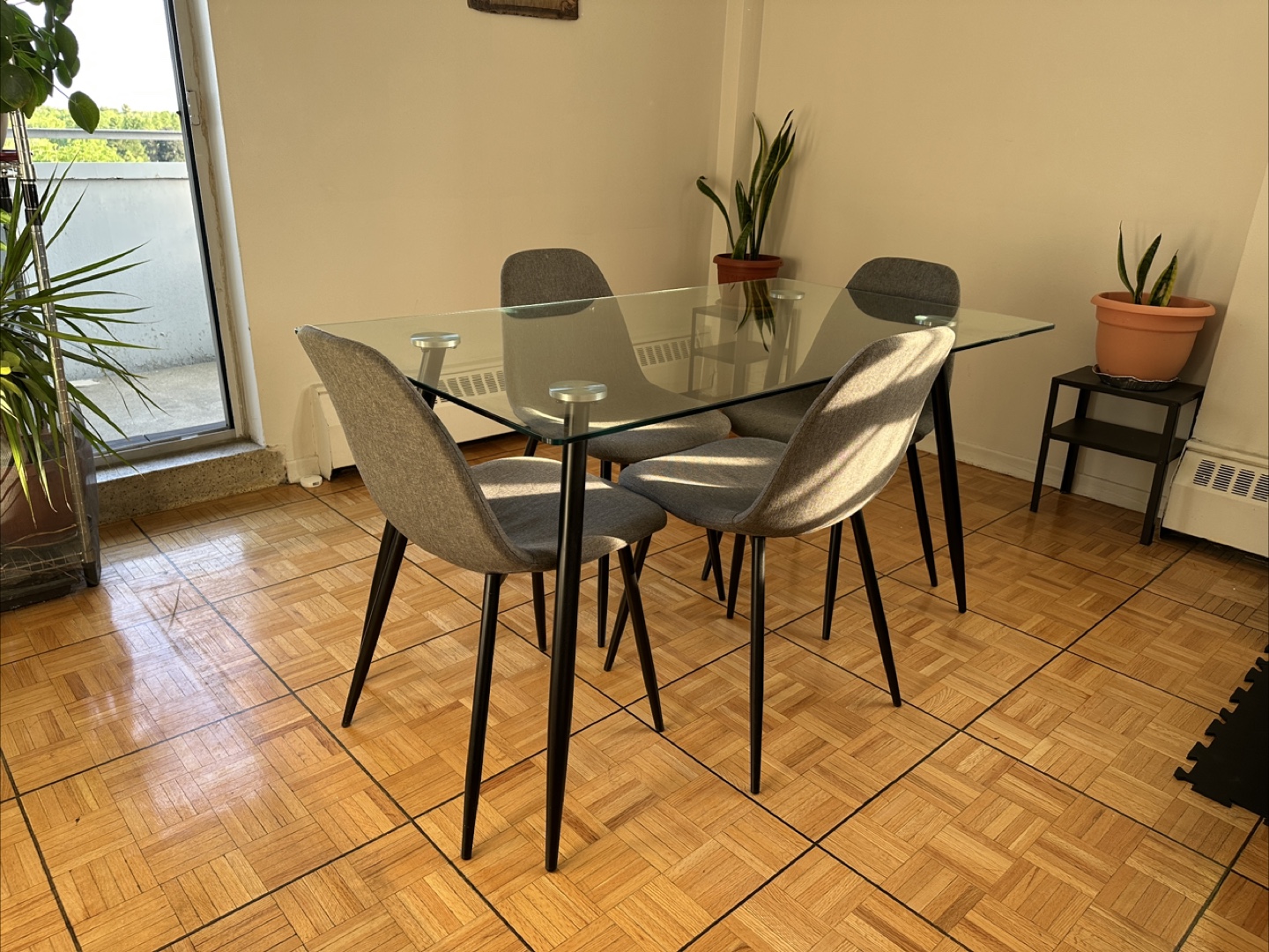 Glass Top Dining Table with 4 Grey Chairs