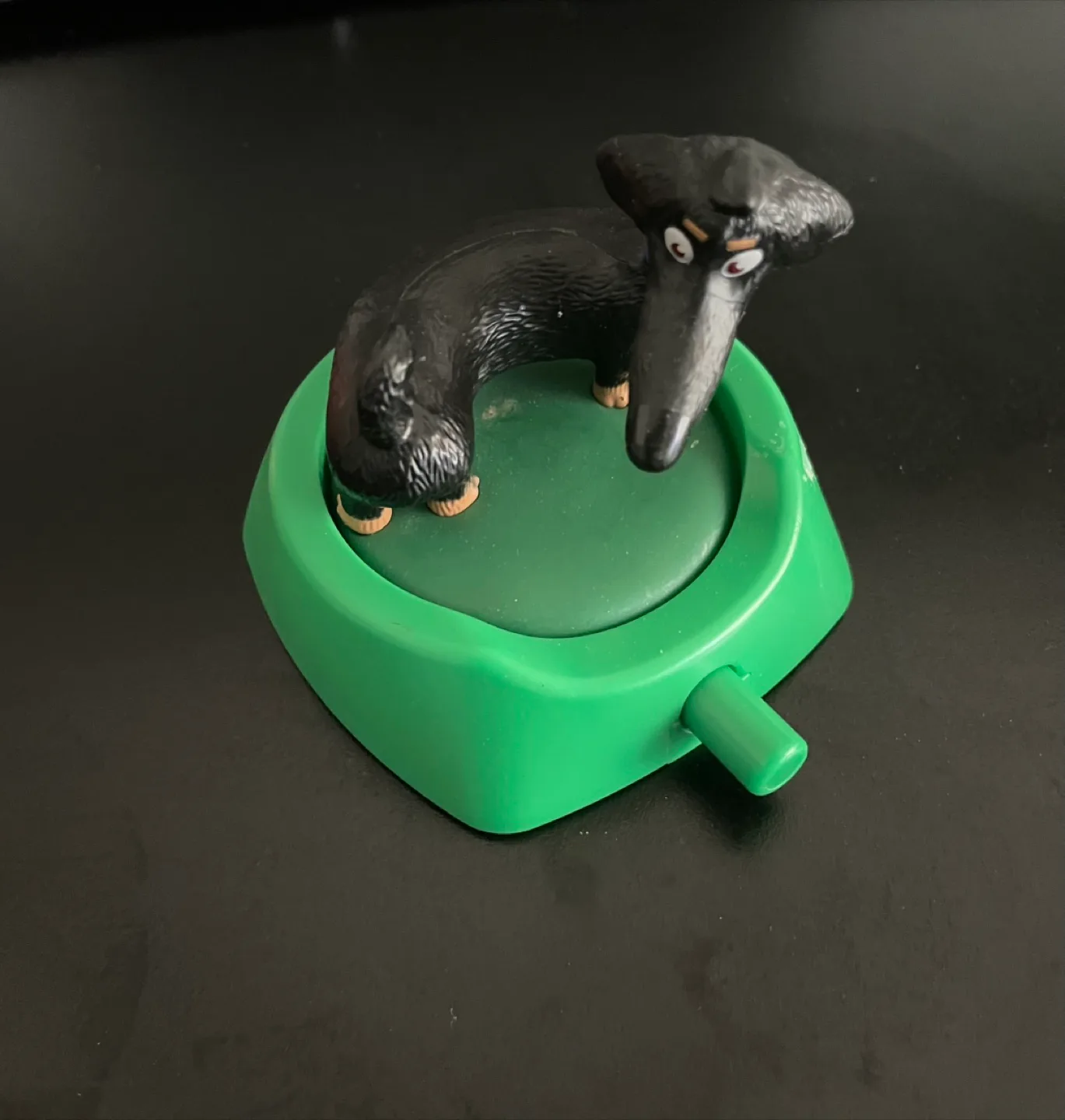 Dachshund Figurine chasing tail thumbnail