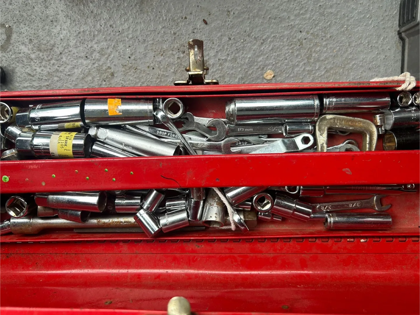 Red Metal Tool Box with Assorted Tools thumbnail