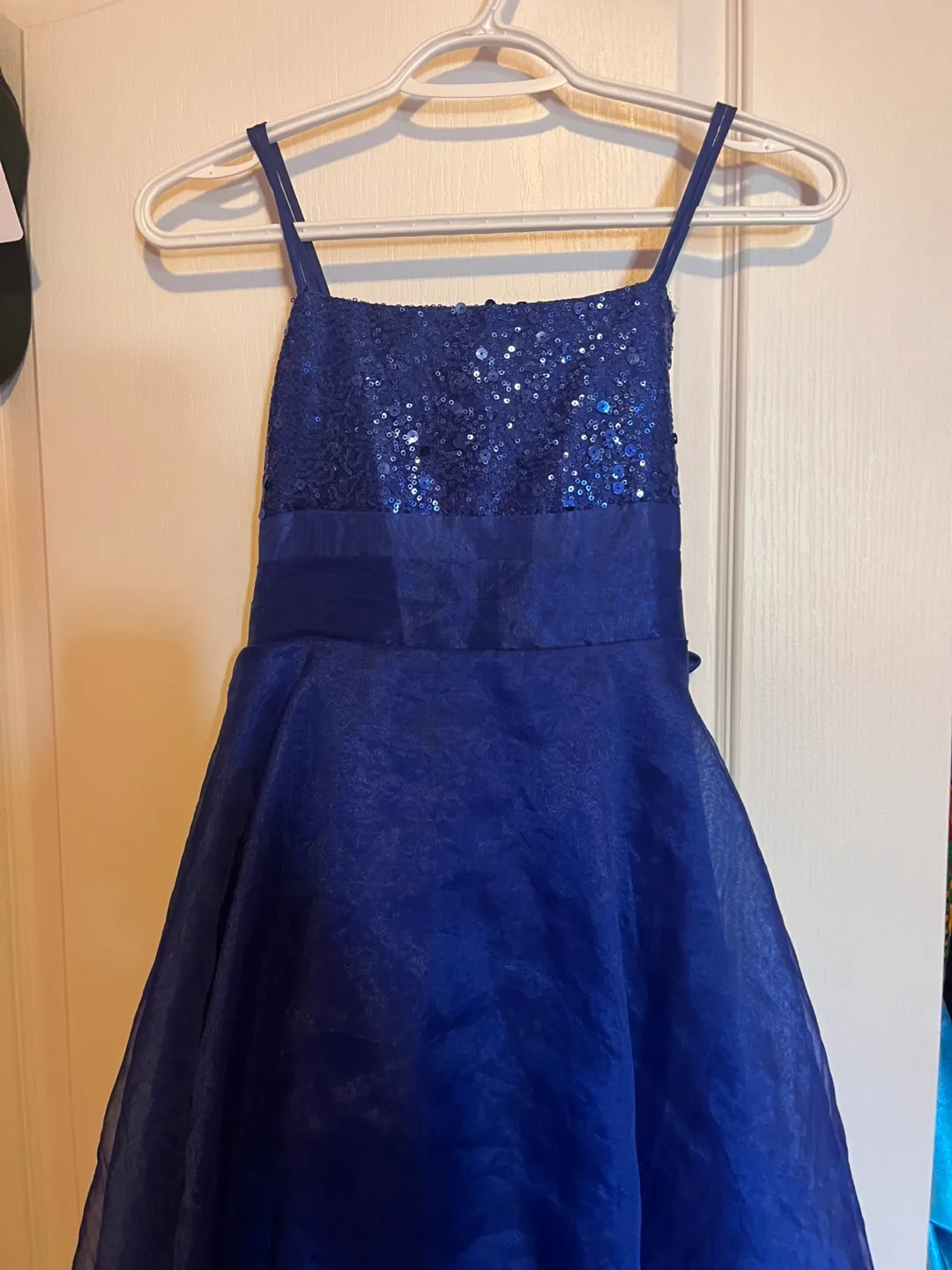 Tween’s dark blue sparkly dress. thumbnail