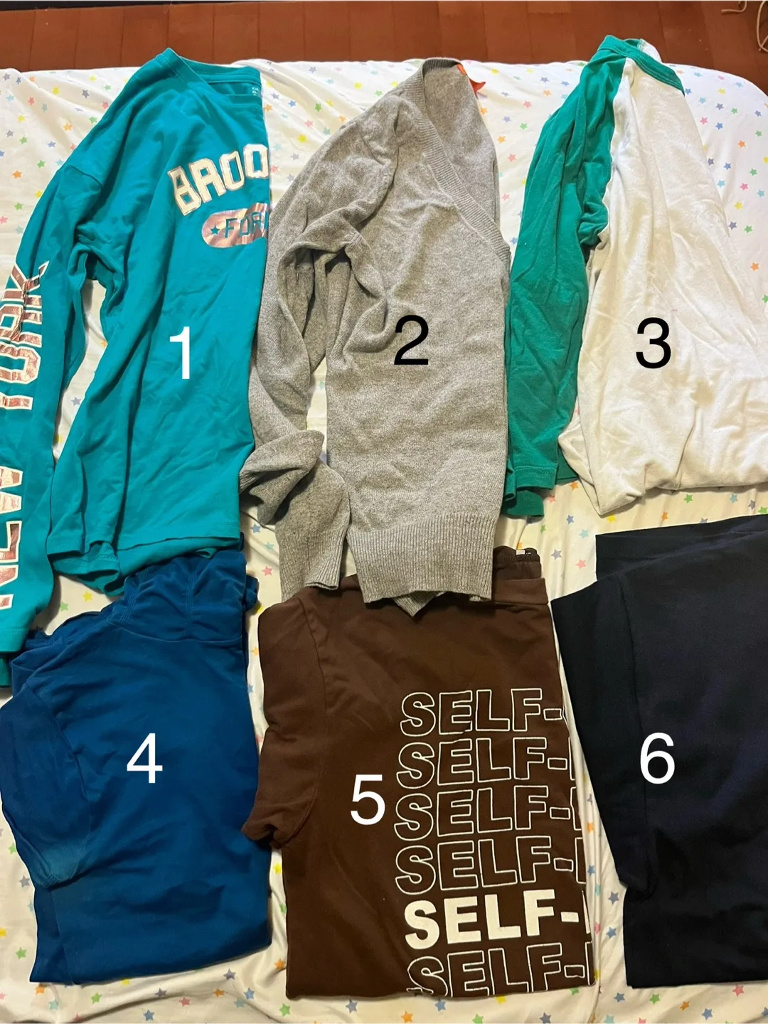 Assorted T-Shirts and Sweater thumbnail