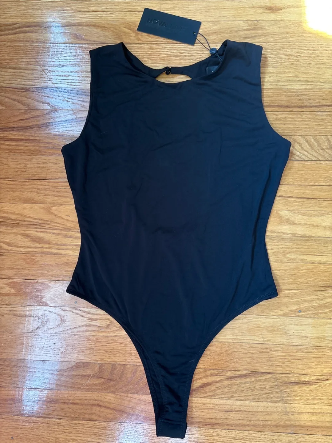 Fashion nova black bodysuit.Size M thumbnail