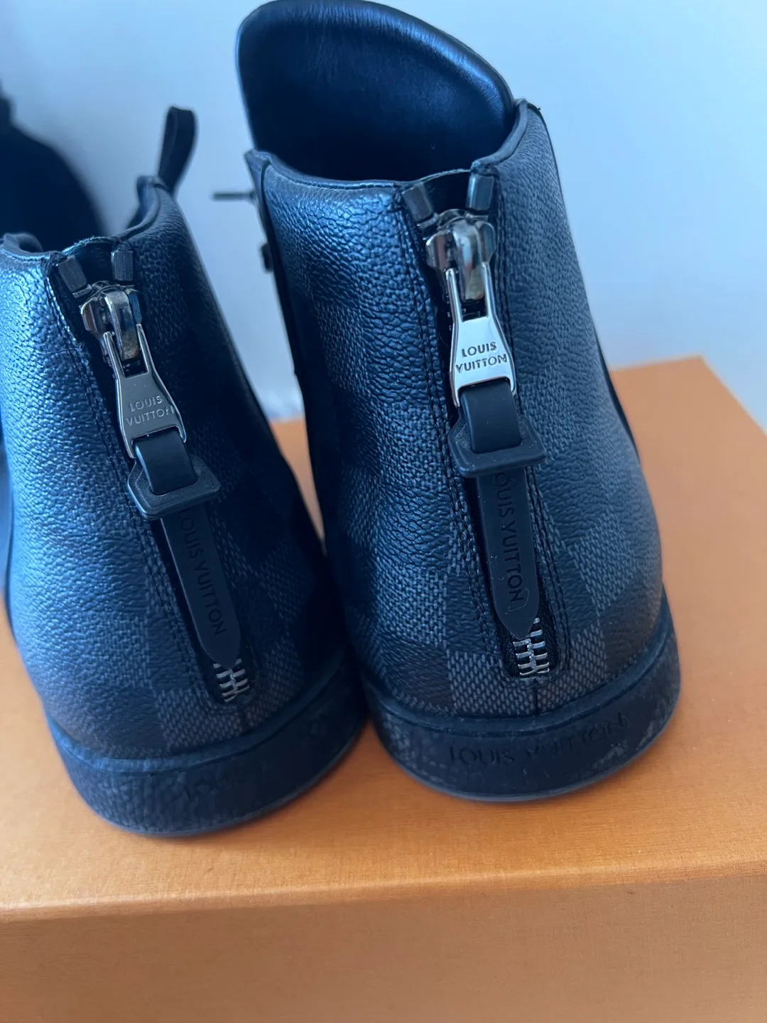 Louis Vuitton Black Leather High-Top Sneakers image indicator(2)