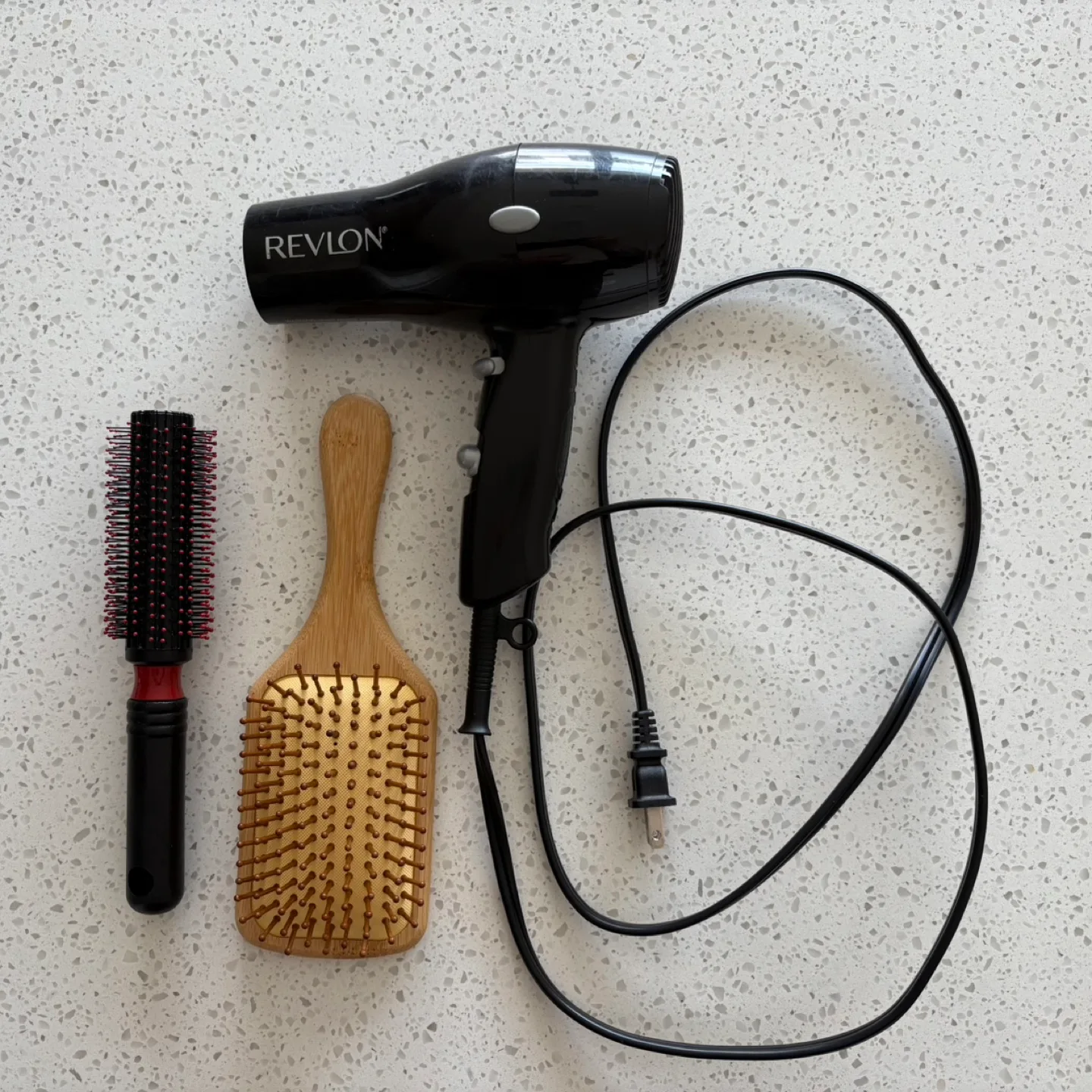Hair dryer + two combs, good condition, disinfected thumbnail