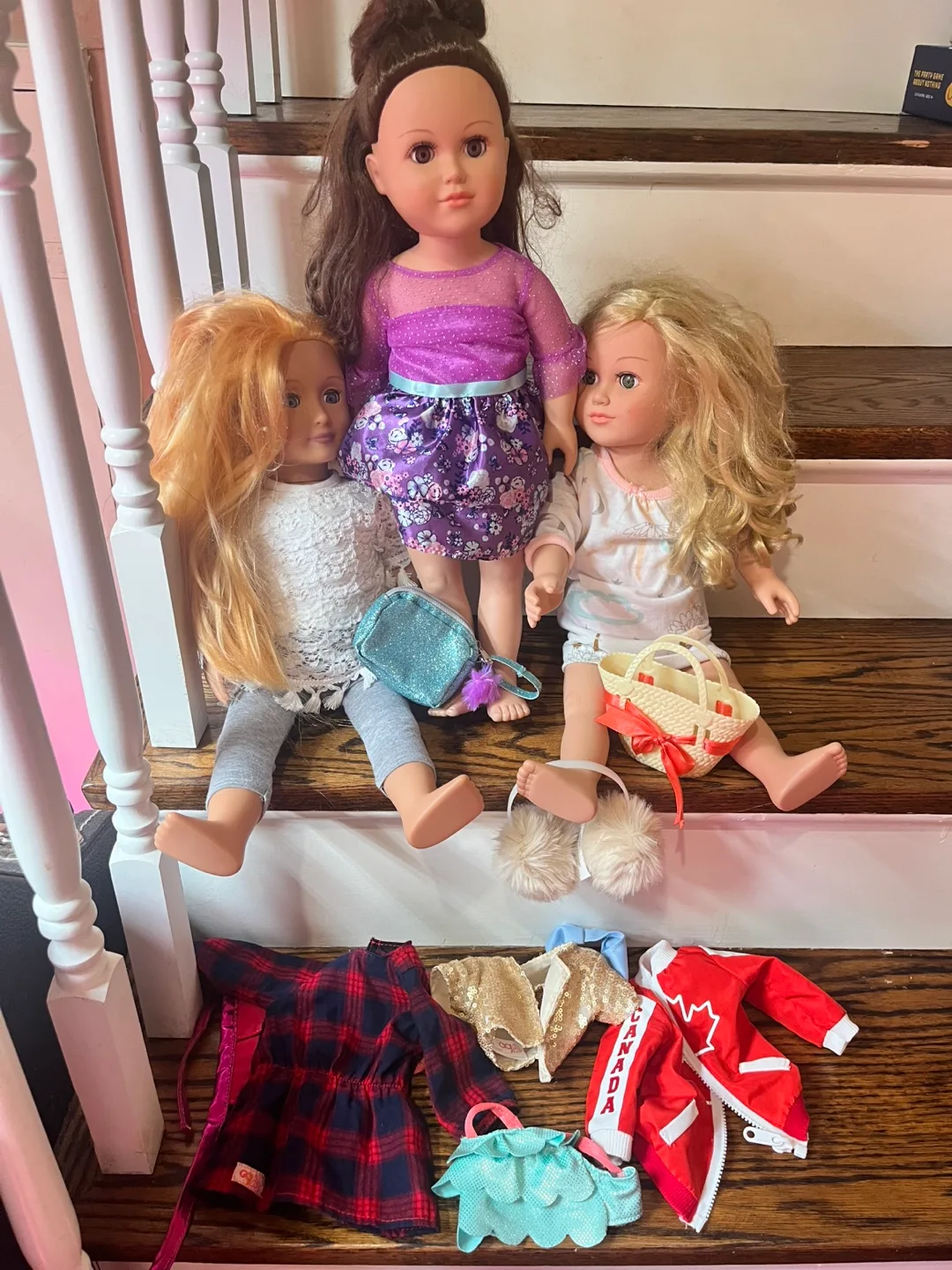 Trio of girl dolls and extra clothes accessories thumbnail