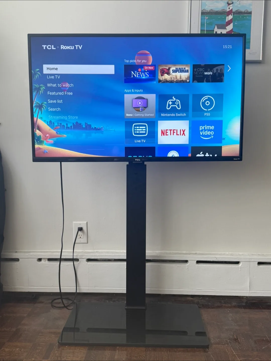 TCL 43" Roku 4K Smart TV and floating TV stand thumbnail