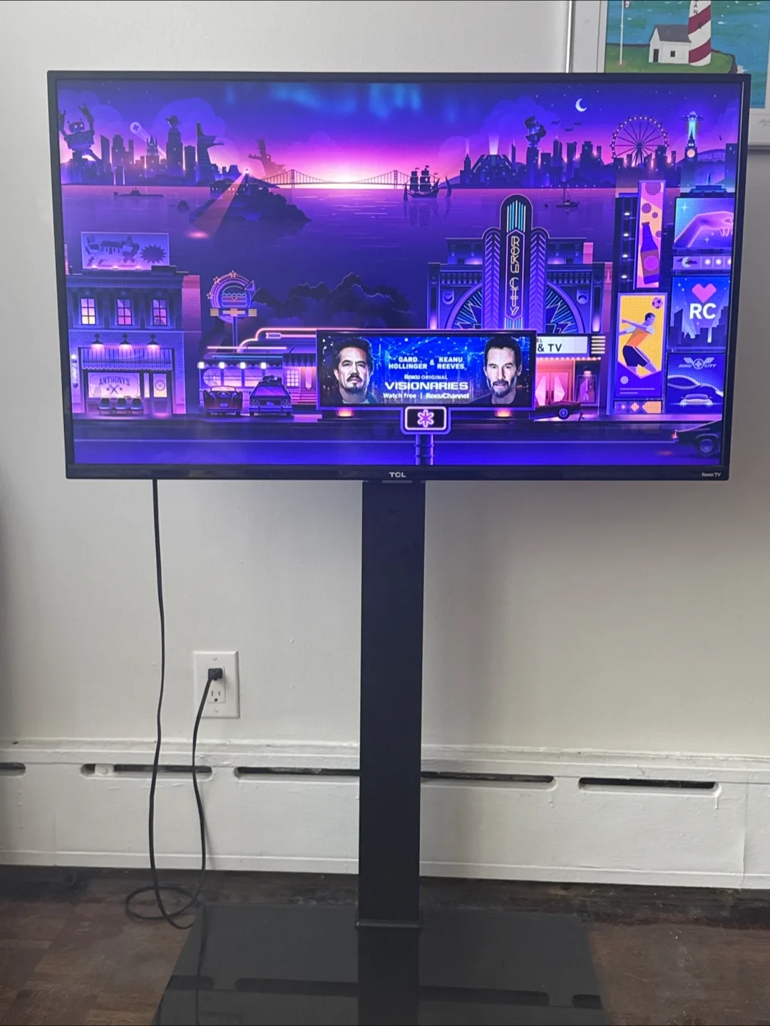 TCL 43" Roku 4K Smart TV and floating TV stand image indicator(5)