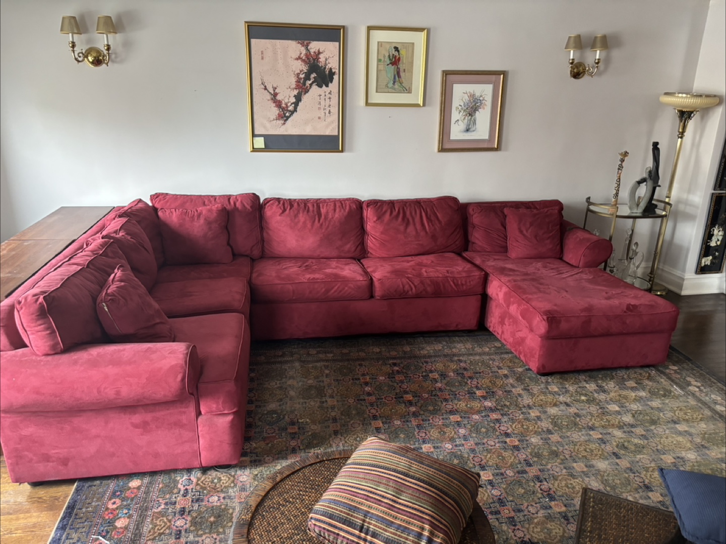 Maroon velvet couch with full size bed