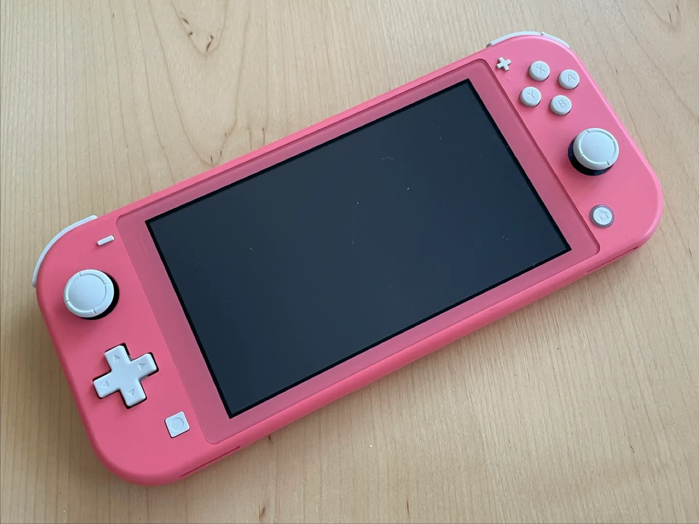 Nintendo Switch Lite - Coral with case thumbnail